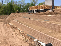 Terraced retaining wall construction