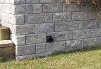 Drain in retaining wall Drain in retaining wall