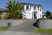 Curved walls by driveway