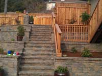 Built in stairs up a tall slope to deck