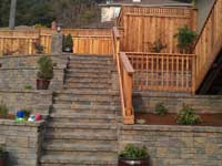 Built in stairs up a tall slope to deck Built in stairs up a tall slope to deck