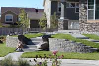 Curved retaining walls with step ups