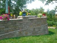 Retaining wall raised patio