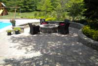 curved seating wall with fire pit