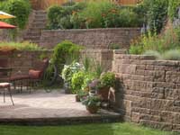 Backyard raised patio with stairs and terraces Backyard raised patio with stairs and terraces