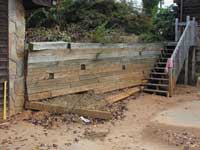 Failing treated timber wall Failing treated timber wall
