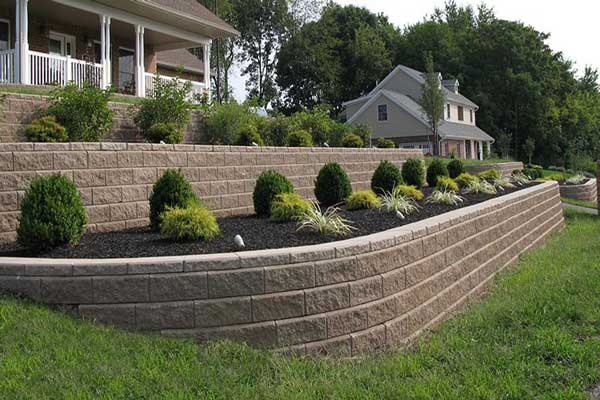 Terraced retaining walls in front yard