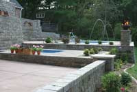 Below ground pool with retaining wall Below ground pool with retaining wall