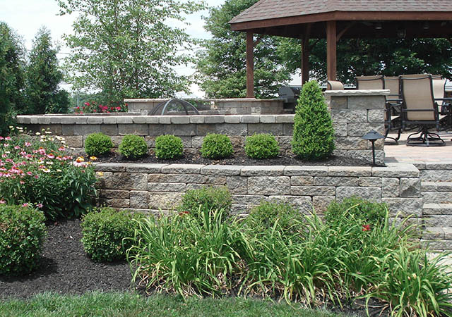 Raised patio with retaining walls Raised patio with retaining walls