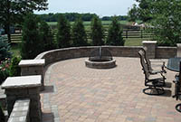 Outdoor patio with patio wall and fire pit Outdoor patio with patio wall and fire pit