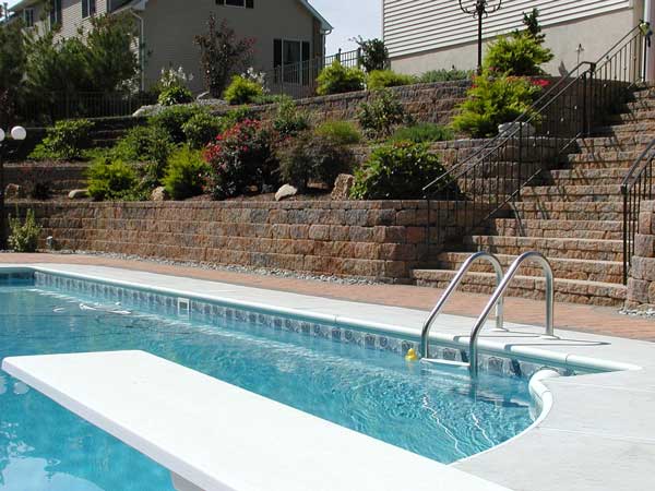 retaining wall with terraces around pool