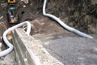 Retaining Wall Construction with Drain Pipe Retaining Wall Construction with Drain Pipe