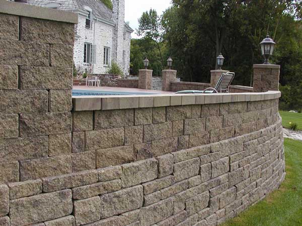 retaining wall with Courtyard around pool