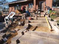 Retaining wall stair construction