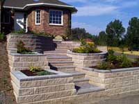 Terraced walls with stairs and planters