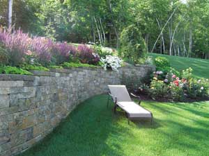 Patterned retaining wall with step downs Patterned retaining wall with step downs