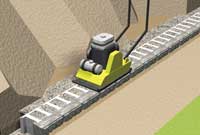 retaining wall installation compact on blocks