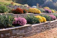 Build a retaining wall and become an AB Certifed Contractor SRW Wall with terrace using AB Collection AB Ashlar Blend